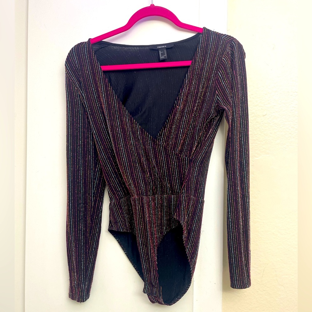 Elegant , dressy shirt for dinner, holidays or date night. I love it.